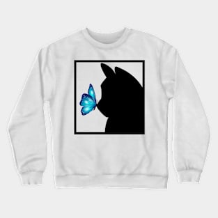 Blue Butterfly sitting on nose of Black Cat Crewneck Sweatshirt